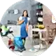 girl cleaning the house floor with wiper and machine