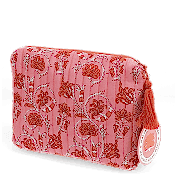 A pink bag featuring a red floral print and a red tassel