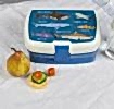 Dark blue plastic lunch box with cream and dark blue lid featuring pictures of sharks