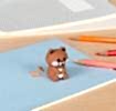 bear shaped pencil sharpener with coloured pencils placed beside