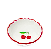 Round ceramic trinket dish with scalloped red edge and cherry design in the center.