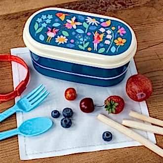 Dark blue plastic bento box with cream lid and middle tray featuring print of fairies amongst flowers