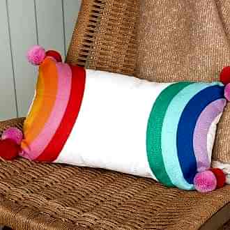 Embroidered cushion with pom poms - Rainbow