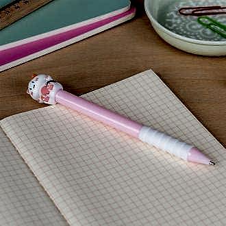 Retractable ballpoint pen in pink showing a cute cat sitting atop