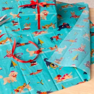 festive friends tissue paper feature illustrations of dogs in winter clothing 