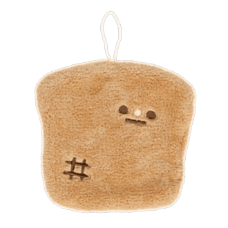 Brown kitchen cloth shaped like a slice of bread with embroidered face and hanging loop