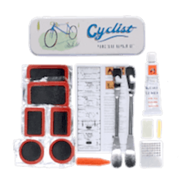 cyclist puncture puncture repair kit beside a storage tin