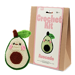 Avocado crochet kit with packaging and finished crocheted avocado beside it
