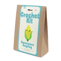 Crochet kit front packaging with printed sweetcorn design