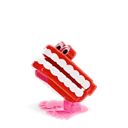 Wind-up toy shaped like red chattering teeth with white teeth, googly eyes, and pink feet