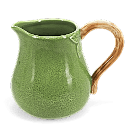Green ceramic jug with textured surface and a curved brown handle