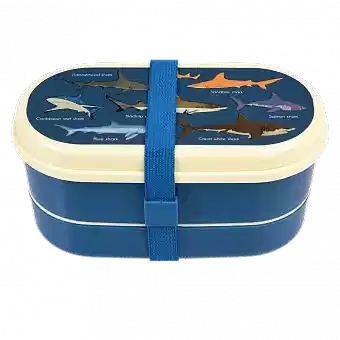 Dark blue kids bento box with cream lid and middle tray plus dark blue elastic strap featuring images of sharks