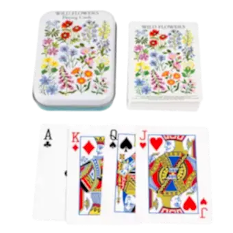 Standard deck of playing cards with print of wild flowers on white background on backs plus metal tin