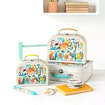 Wild Wonders storage cases with 6 in 1 pen, memory game and notebook on table