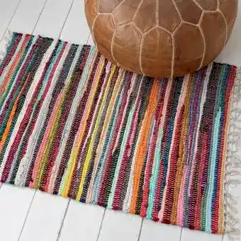 Handloomed multicoloured cotton rug