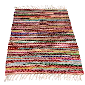 Multicoloured handloomed cotton rug laid flat