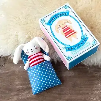 White bunny in a little box for baby and toddler.
