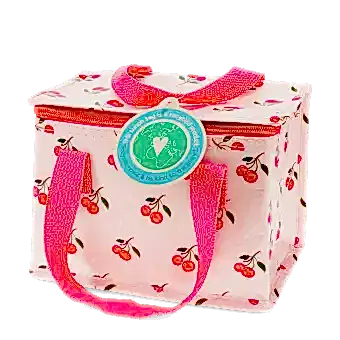 Insulated lunch bag decorated with cherry pattern on a light pink background and featuring a tag