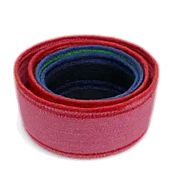 Stacked woven storage baskets in varying sizes and colours