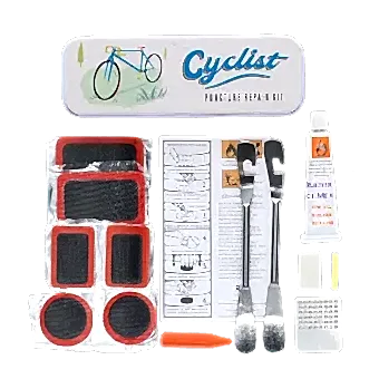 cyclist puncture puncture repair kit beside a storage tin