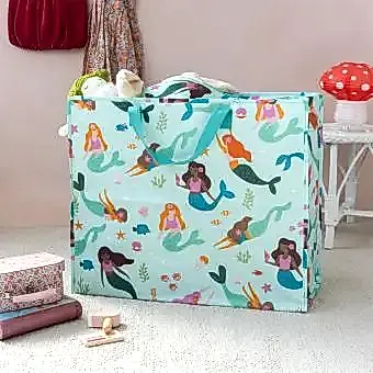 large rectangular bag with a light blue background, featuring colourful mermaid print