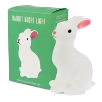 Rabbit-shaped battery-powered night light with pink ears, placed next to packaging box
