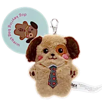 dog-shaped plush keyring wearing a tie with brown ears and a tag