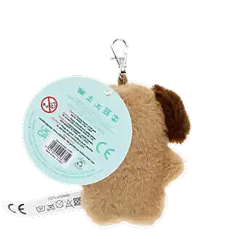 dog-shaped plush keyring wearing a tie with brown ears and a tag with safety warnings