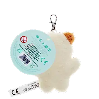 Cat-shaped plush keyring with a metal clasp and a tag with safety warnings