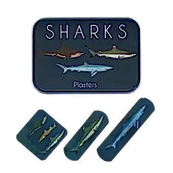 Sharks-printed plasters placed beside a matching storage tin featuring sharks illustrations