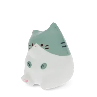 Green and white squidgy stress cat in a sitting design