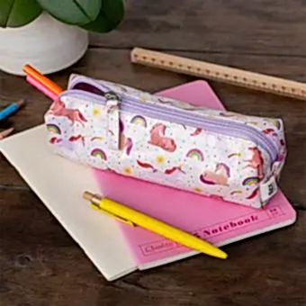 Pencil case in pink featuring colourful illustrations of unicorns, rainbows and stars