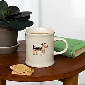 Stoneware mug featuring a dog with handle