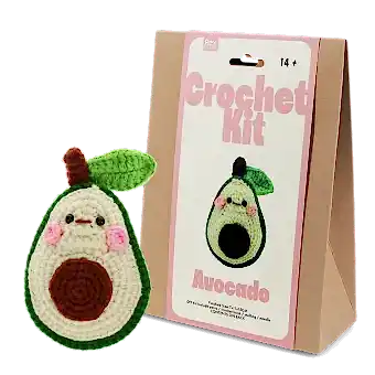 Avocado crochet kit with packaging and finished crocheted avocado beside it
