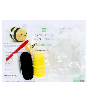 Crochet kit with yarn, crochet hook, stuffing, stitch markers, and instructions
