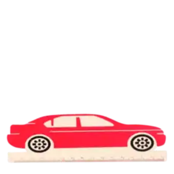 A red ruler shaped like a car with measurement markings along the bottom edge