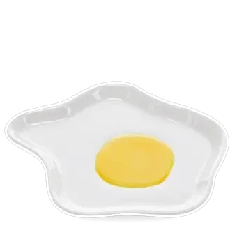 White ceramic trinket dish shaped like a fried egg with yellow yolk design