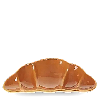 Brown ceramic trinket dish shaped like a croissant.
