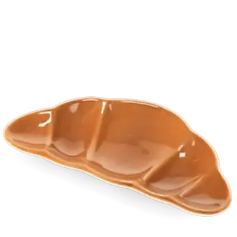 Brown ceramic trinket dish shaped like a croissant.