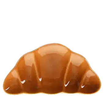 Brown ceramic trinket dish shaped like a croissant.