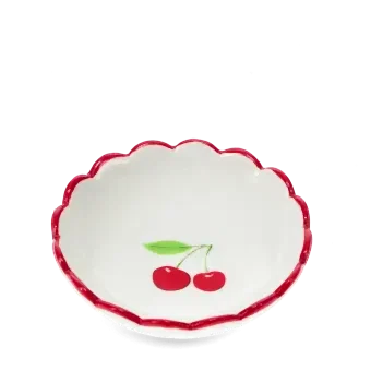 Round ceramic trinket dish with scalloped red edge and cherry design in the center.