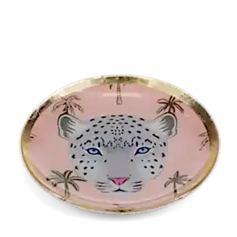 Round trinket dish with gold rim, pink background, palm tree pattern, and a leopard face design