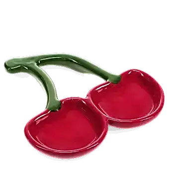 Red ceramic trinket dish shaped like two cherries with green stems.