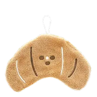 Brown kitchen cloth shaped like a croissant with hanging loop