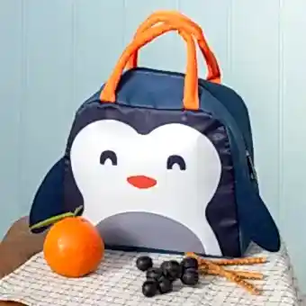 Navy blue lunch bag with orange handles and a cute penguin face design on the front and a black wings on each side