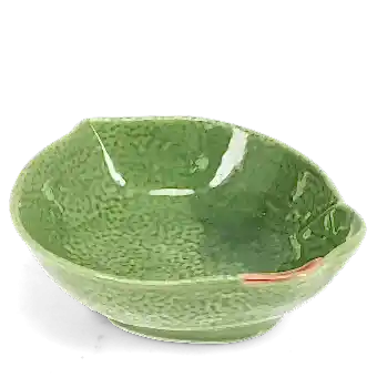 Green ceramic bowl with textured surface and a leaf design near the rim with brown stem accent