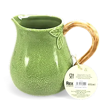 Green ceramic jug with textured surface and a curved brown handle with tag