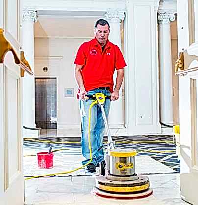 man polishing the floor