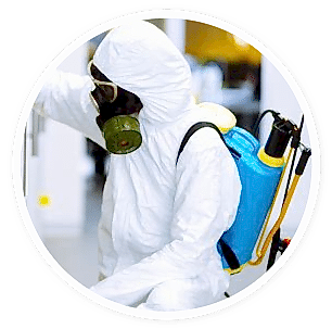 man in PPE kit with sanitization equipment